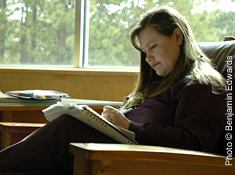 Student Reading in Campus Library