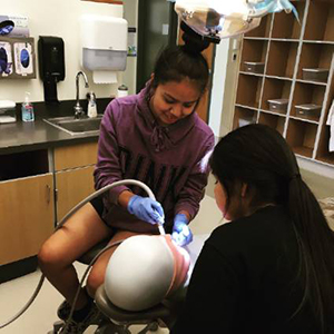 STRIVE students attend a dentistry class